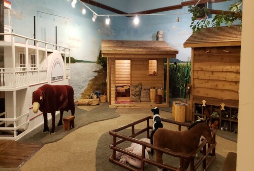 Interactive Center with log cabins and animals Heritage Center Museum